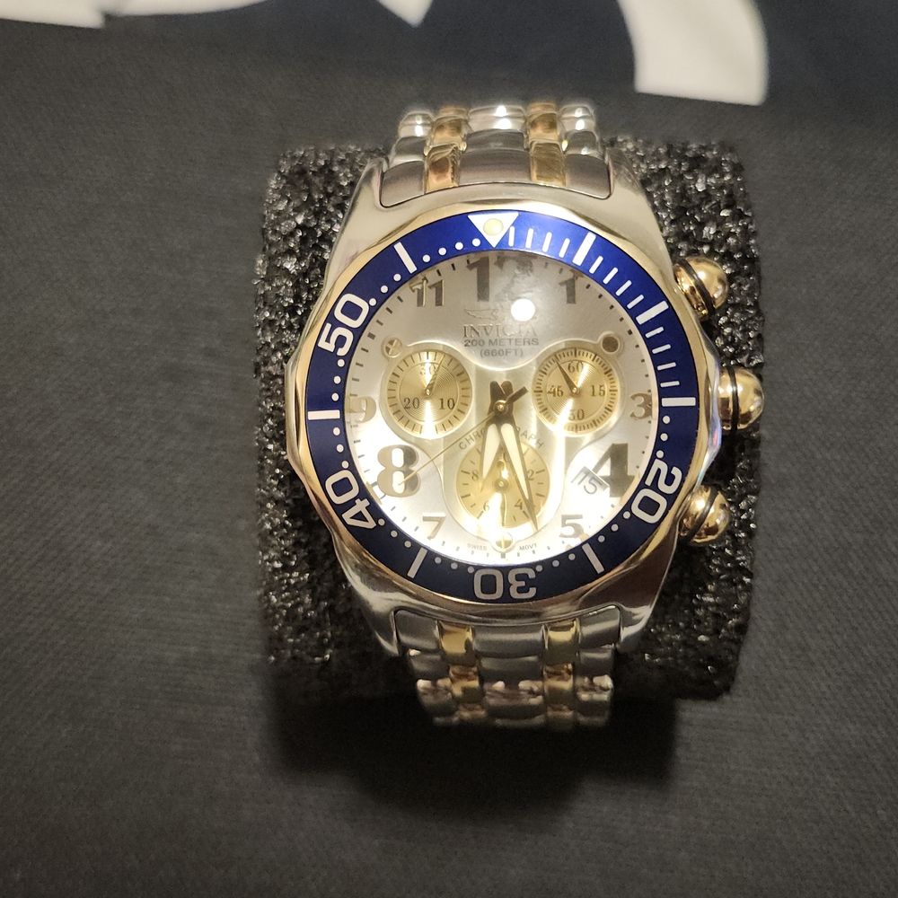 Invicta Silver and Gold Chronograph Watch